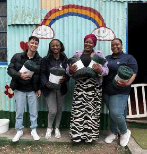 Tavcor-Motor-Group-Blanket-Drive-2025-Team donating blankets to communities